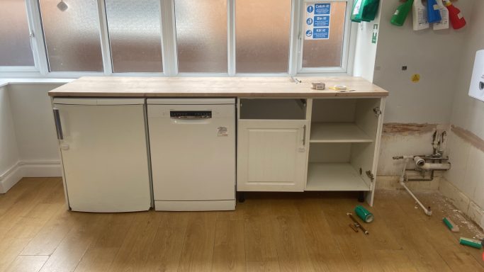 Remove the old sink cabinet