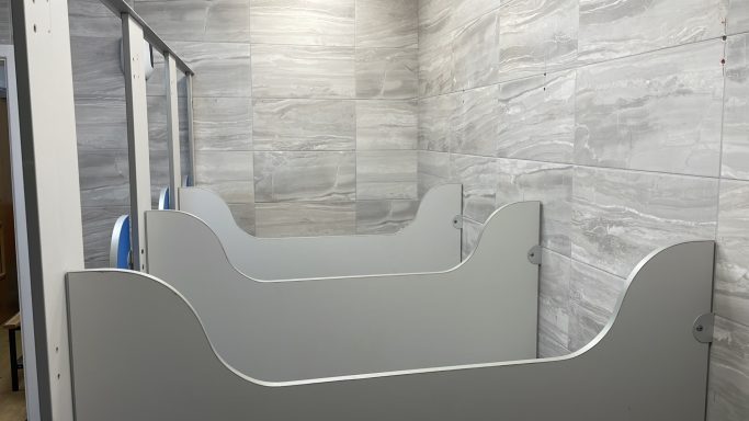 Adult cubicle side panels adapted for children
