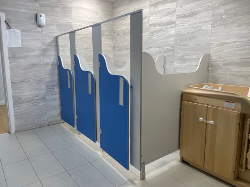 Adult cubicle doors adapted for children